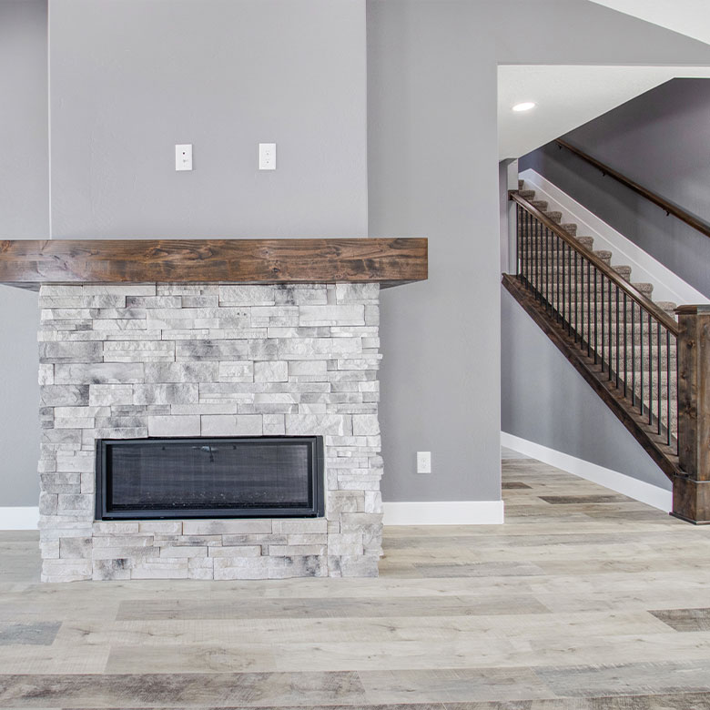 Braemar New Home Construction fireplace and stairway