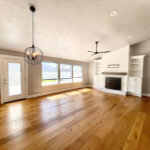 Braemar New Home Construction Living room with fireplace